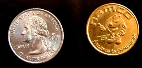 Funny Money - orange one dollar coin looks like videogame money